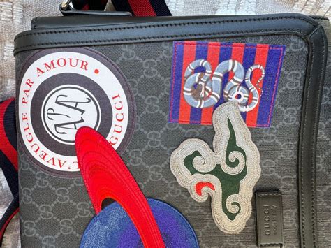 GUCCI GG Supreme Monogram Night Courrier Flap .